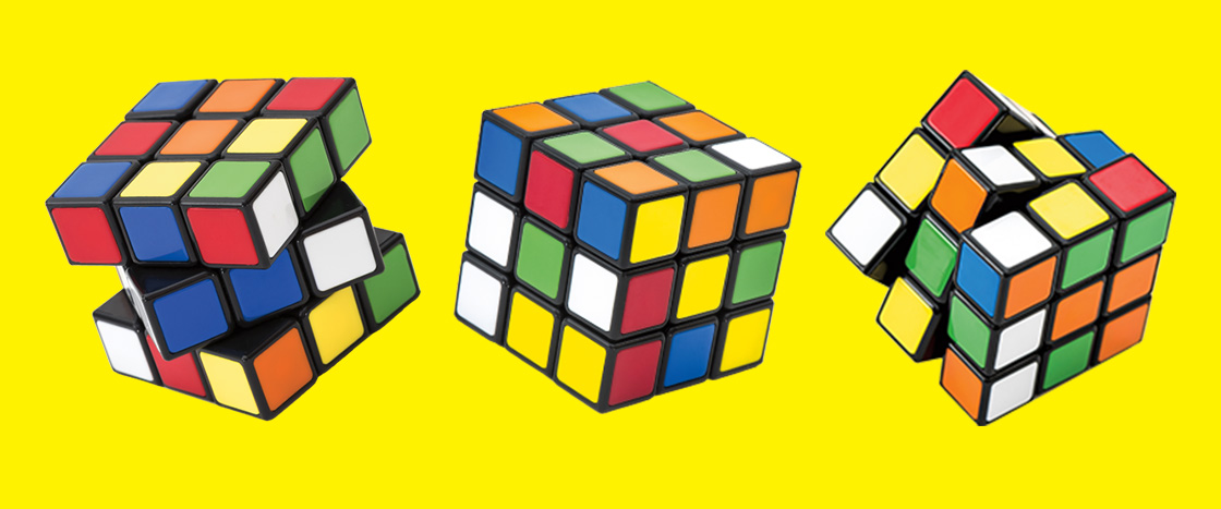 Image of three Rubik cubes